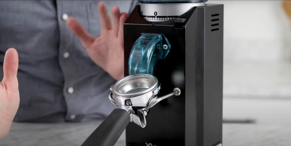 The machine grinds coffee
